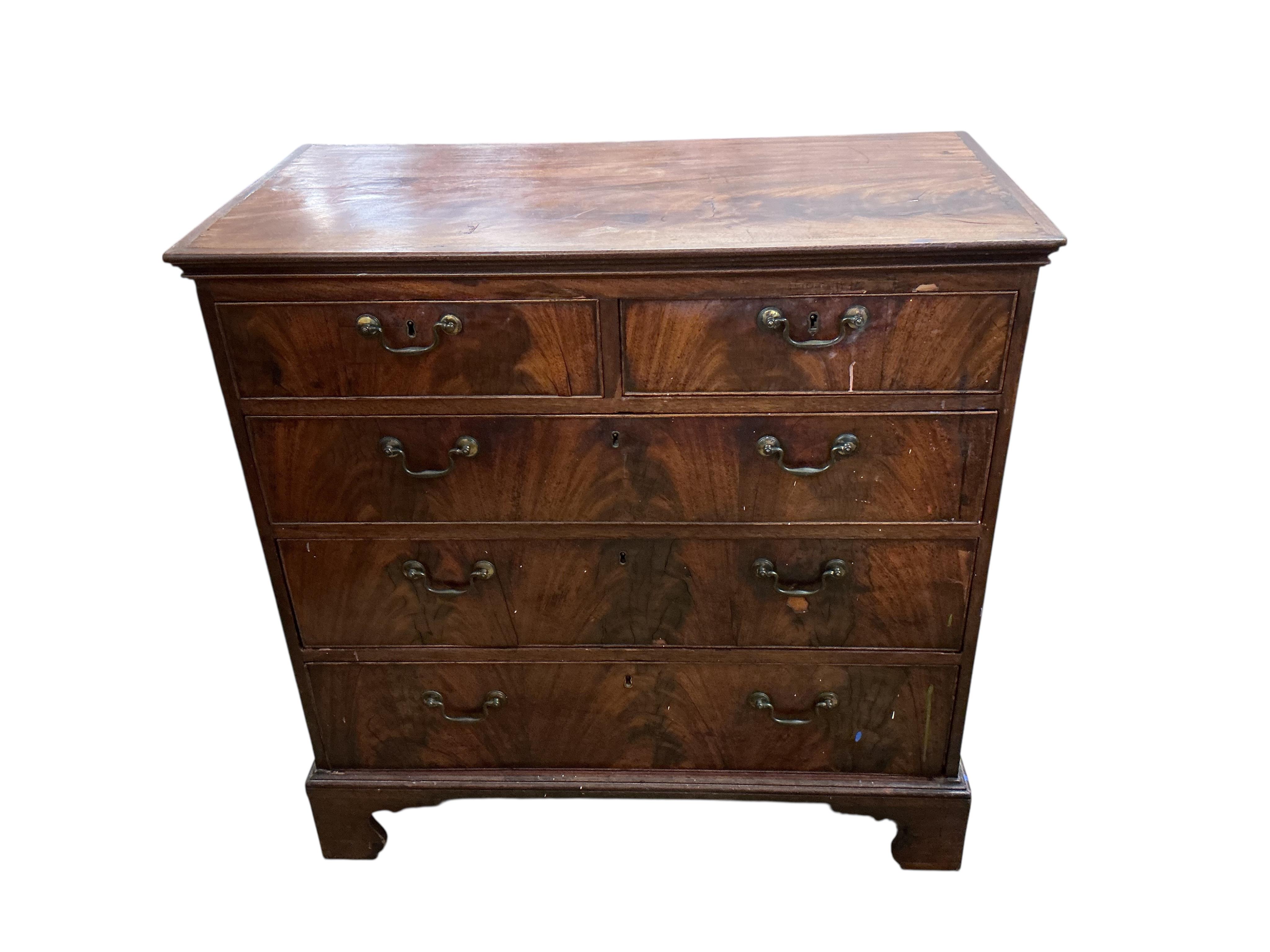 A George III mahogany chest of four long drawers, on bracket feet, width 95cm, depth 49cm, height 94cm